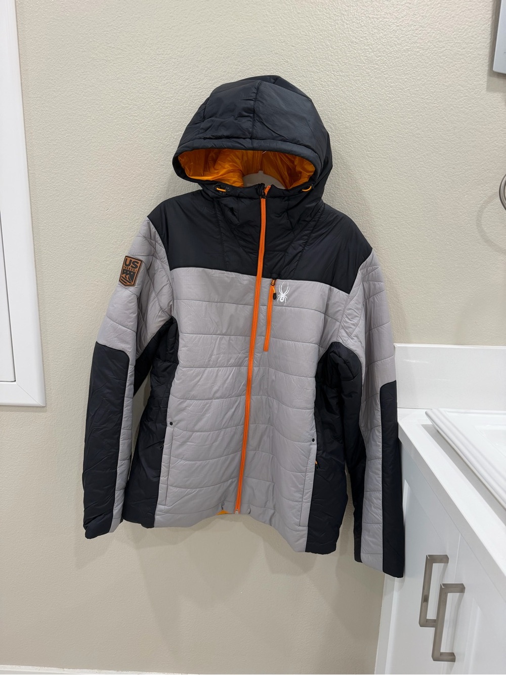 Spyder Men’s Hooded Puffer Jacket in Gray, Black & Orange